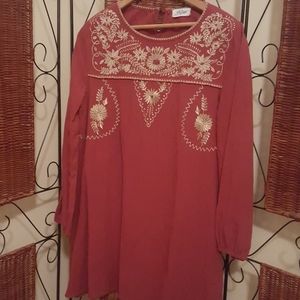 Gold embroidered red tunic